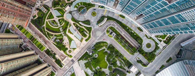 Aerial view of a housing complex in Hong Kong with a park in the middle