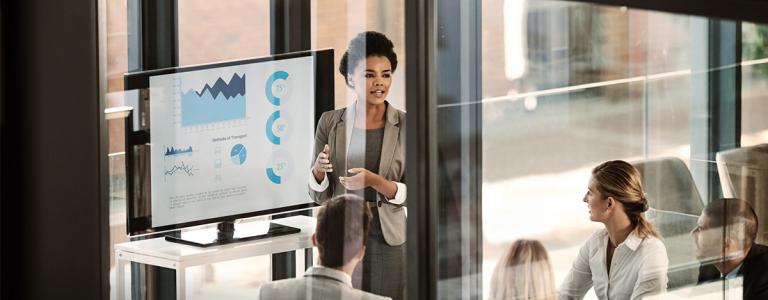 Shot of a businesswoman delivering a presentation to her colleagues in the boardroom