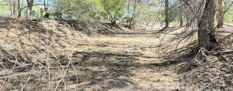 The Nsongwe River currently stands mostly dry